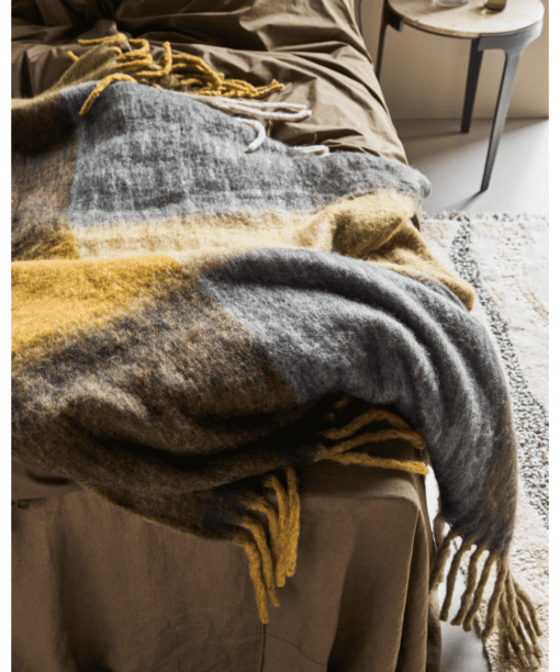 Handmade plaid with tassels